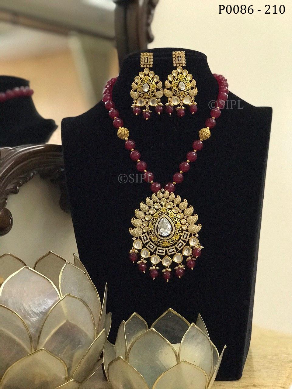 gold kundan pendant set